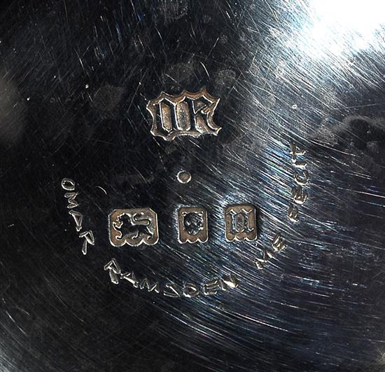 A George V Arts & Crafts silver raised circular dish, by Omar Ramsden, Dia (to Rose motifs) 165mm, weight 7.2ozs/226grms